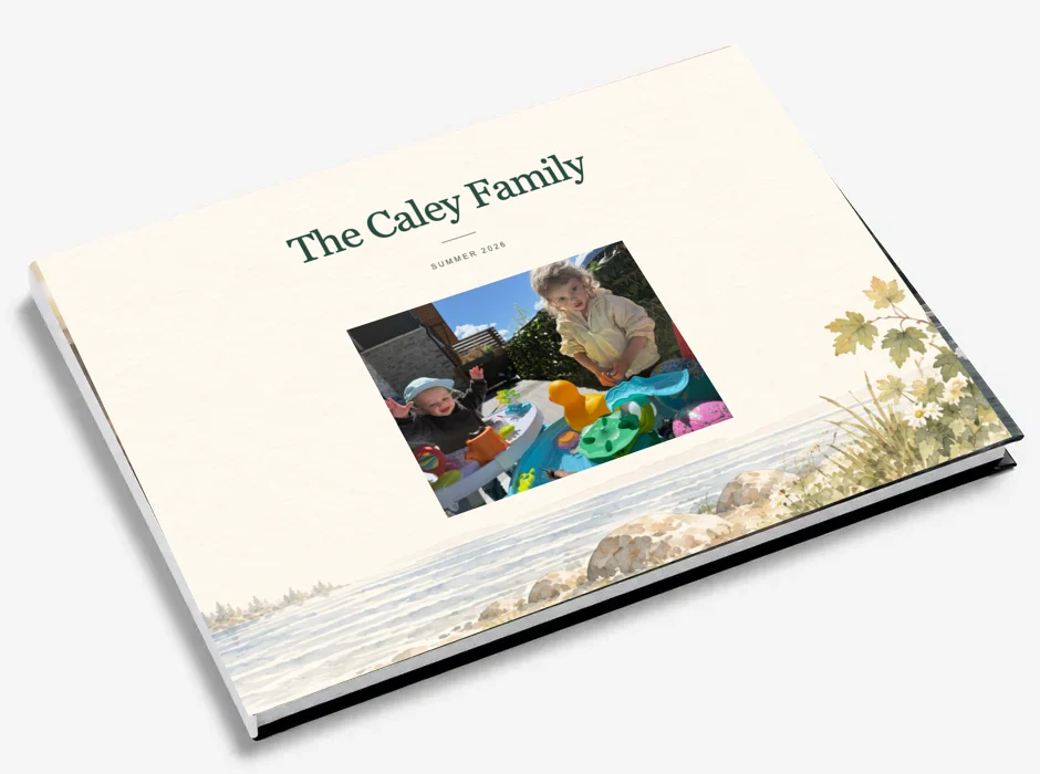 Nicole&rsquo;s summer cover on the layflat hardcover Tuck prints: a watercolor lakeshore, the family photo, and the family name.